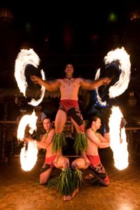 An exciting pyramid of fire dancers creating dramatic rings of fire on the Mai-Kai stage.